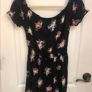 Black off the shoulder dress with floral pattern